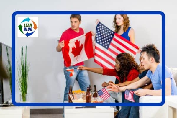 fans watching the olympics on TV waving US and Canadian flags